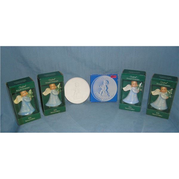 Collection of Goebel Christmas angel ornaments and a Goebel collector's club membership plaque