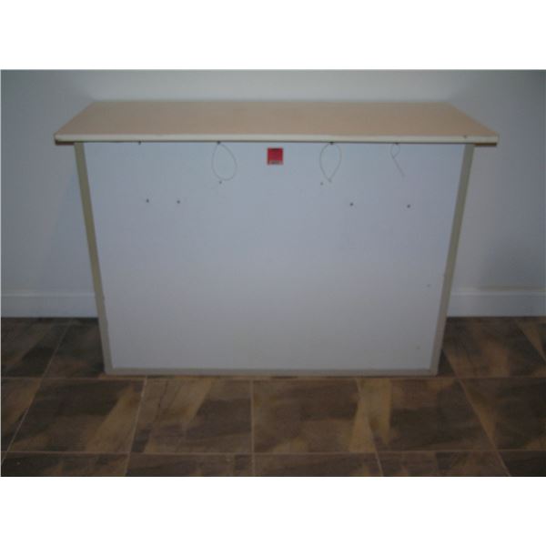 Portable bar with rear storage area