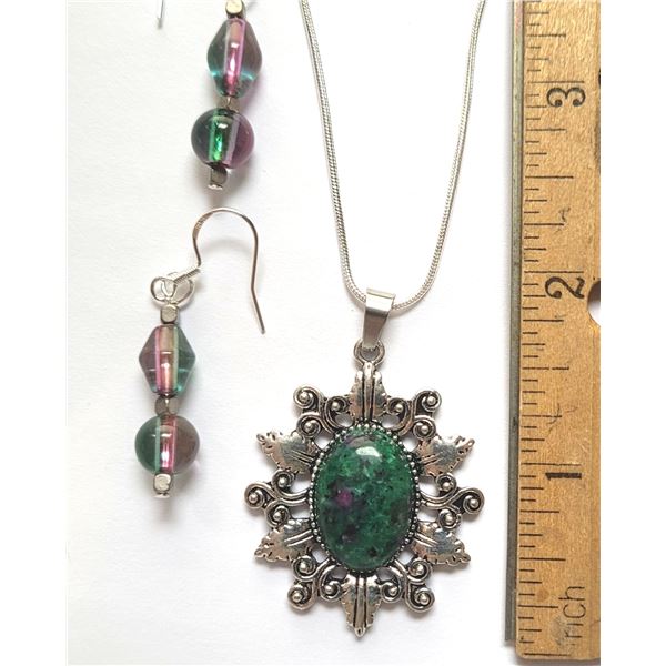 8)  TIBETAN SILVER WITH OVAL RUBY IN FUCHITE