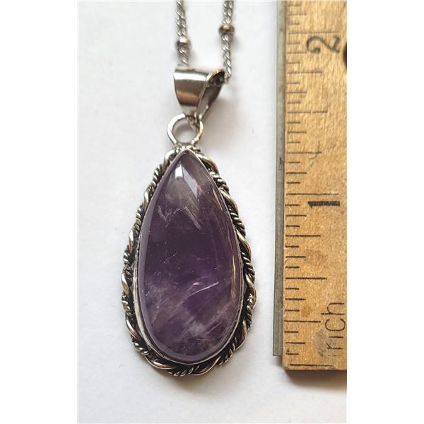 19)  NATURAL ELONGATED AMETHYST PENDANT
