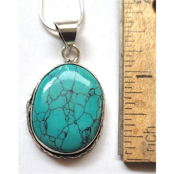 18)  NATURAL OVAL TURQUOISE PENDANT ON
