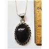 16)  NATURAL OVAL BLACK ONYX PENDANT ON