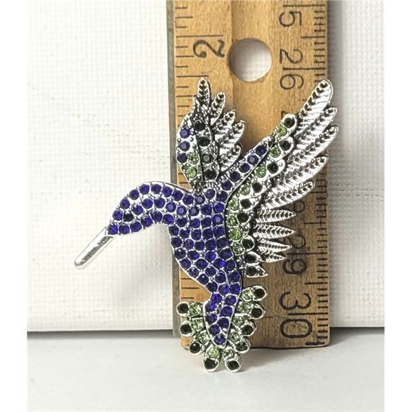 8)  SILVER TONE WITH PURPLE, GREEN & BLACK