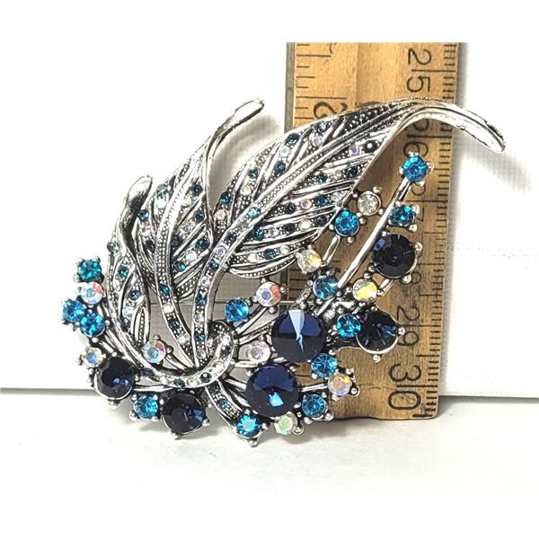 10)  SILVER TONE WITH CLEAR, TURQUOISE AND