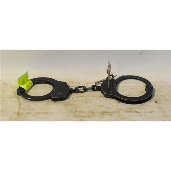 SET OF HEAVY METAL HANDCUFFS WITH KEYS