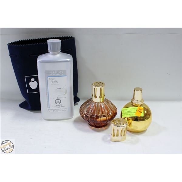 2 ESTATE GOLD TONED LAMPE BERGERS + HALF BOTTLE