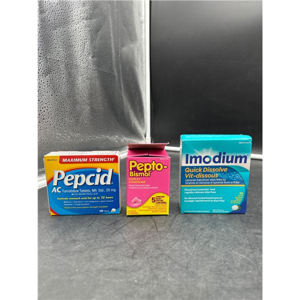 Assorted Nausea Medication : Pepcid AC, Pepto-Bismol, and Imodium Quick Dissolve