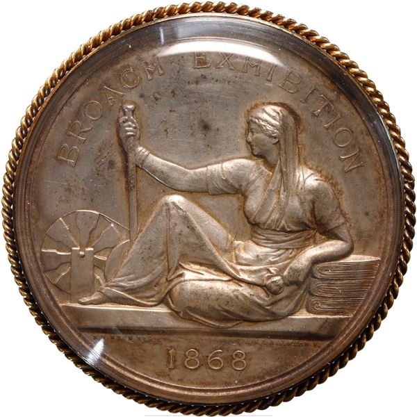INDIA (British), silver award medal in glass bezel, 1868, Broach Exhibition, by Wyon, rare.