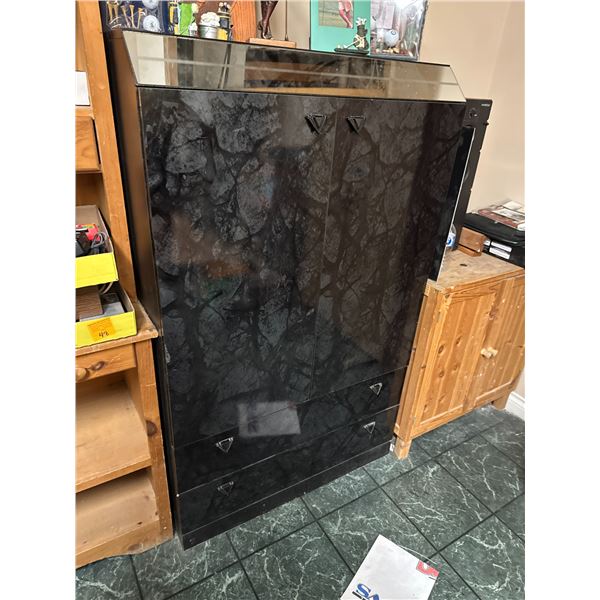 Dresser measures 35 1/2" x 19" x 58 1/2" tall