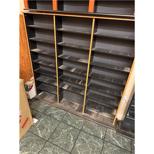 Shelf with adjustable shelving measures 54" x 6 1/2" x 52" tall