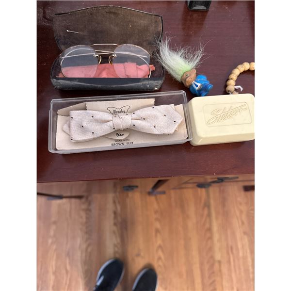 Vintage glasses, Stetson soap, troll bracelet, and tie