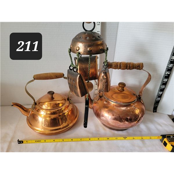 Copper kettles & wind chime.