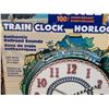 Image 5 : Lionel 100 ann. Train clock. Light sensor, sounds, train travels around the clock.