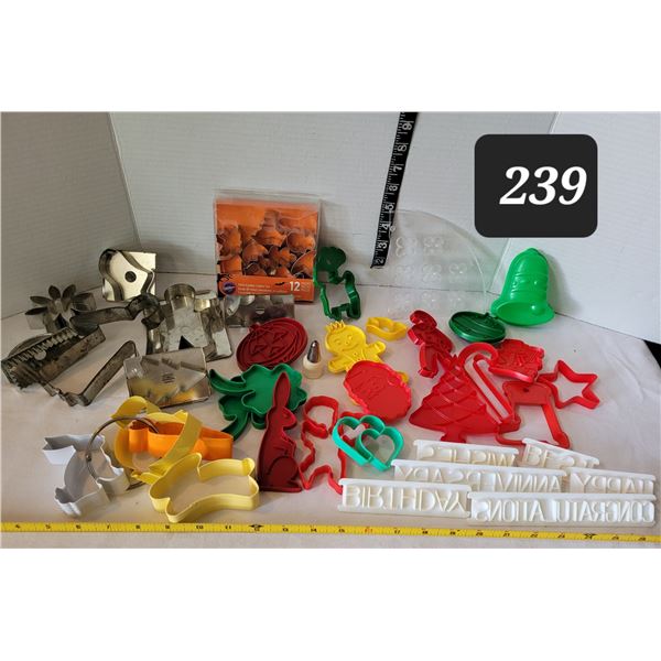 Assorted vintage & newer cookie cutters.