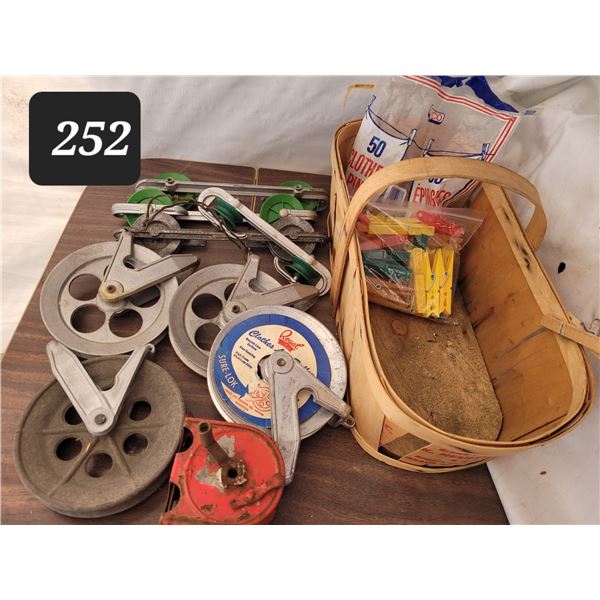 Vintage clothes line pulleys, pins & accessories.