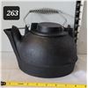 Image 1 : Cast iron kettle with attached lid.
