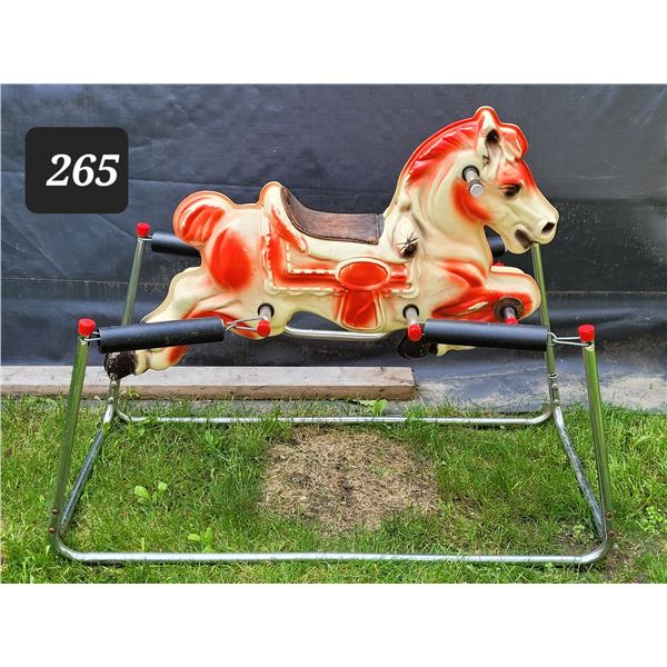 Mid century spring horse with leather seat.