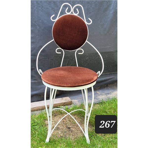 Vintage wrought iron vanity chair. Excellent condition.