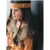 Image 5 : Sabre, hand crafted porcelain Native American girl in traditional dress.
