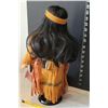 Image 7 : Sabre, hand crafted porcelain Native American girl in traditional dress.