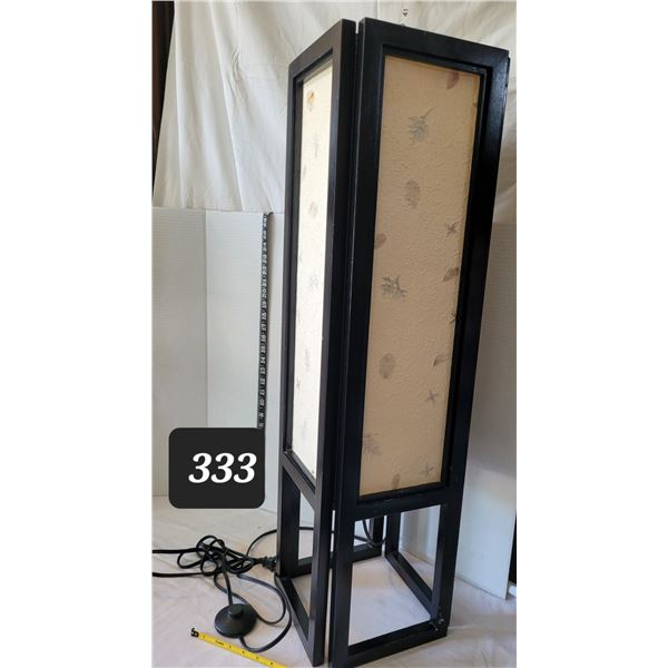 Ambiance floor lamp. Step on foot switch. 3 ft. High.