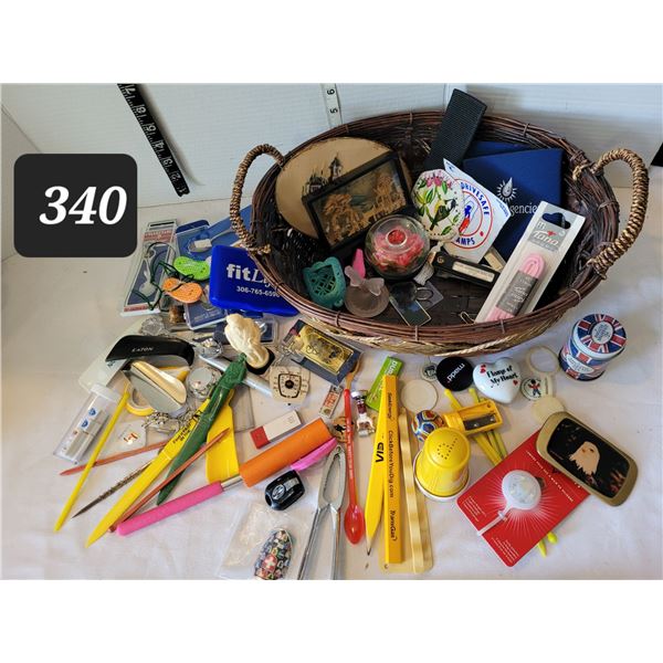 Junk drawer items in a basket.