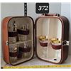 Image 1 : Vintage travel bar. Mid century with glassware of the time period.