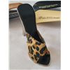 Image 5 : Unique wild eye leopard high heel bottle opener. 4 vintage advertising shoe horns.