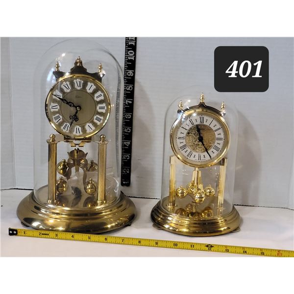 Vintage brass self wind dome mantle clock. Battery operated dome clock. Both from West Germany.