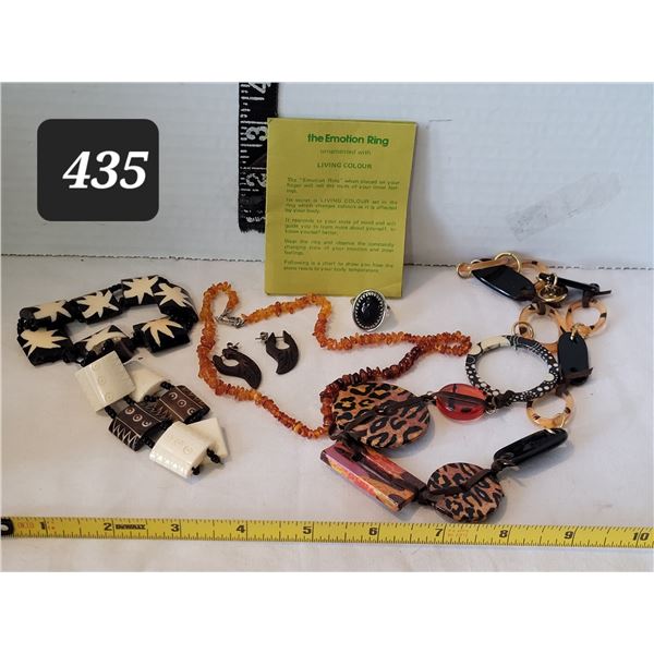 1970's jewelry including original mood ring & genuine amber in little suit case box.