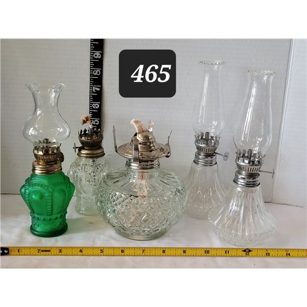 Group of small oil lamps.