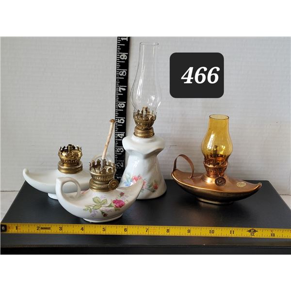 Group of Aladdin oil lamps.