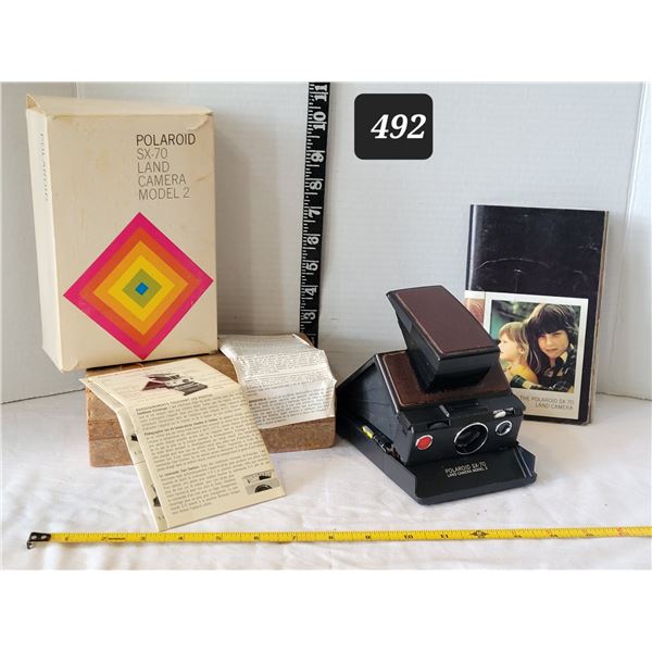 Vintage Polaroid SX-70 model 2 land camera. Original box & packaging.