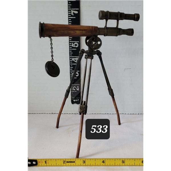 Unique telescope pen holder.