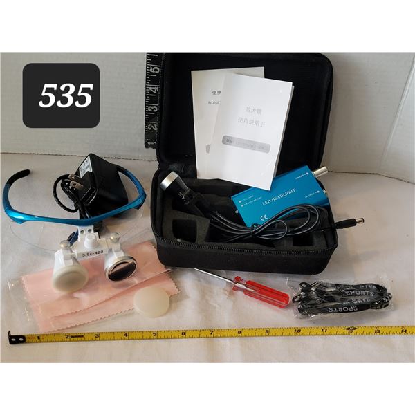 Surgical lighted magnifiers. Led light & accessories.