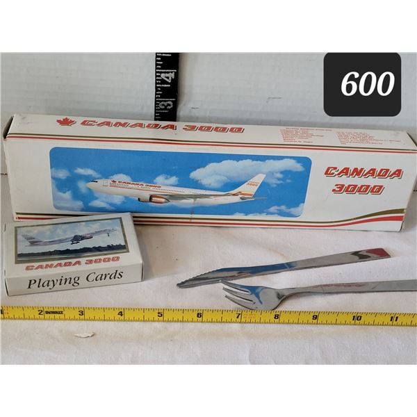Canada 3000 jet model & playing card. Vtg. American Airlines cutlery.