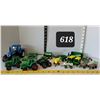 Image 1 : Assorted farming equipment toys.