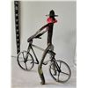 Image 3 : Horseshoe man riding bike.Handmade by Pasquia Forge, Hudson Bay.