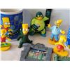 Image 2 : Group of The Simpsons collectibles.