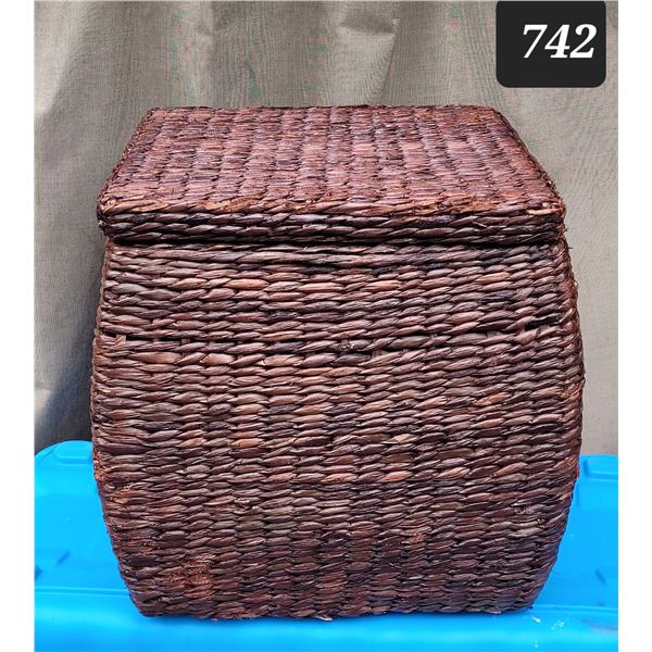 Wicker weave storage footstool.