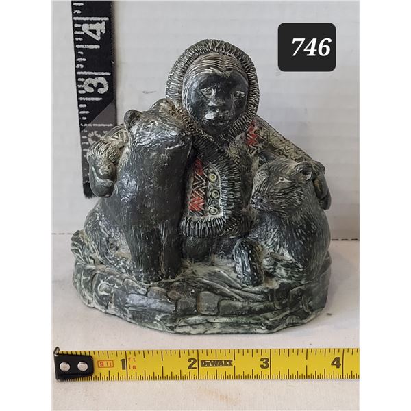 Inuit soapstone carving.