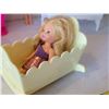 Image 3 : Barbie in the baby's room.