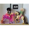Image 1 : Barbie dolls on horse back.