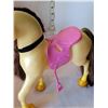 Image 4 : Barbie dolls on horse back.