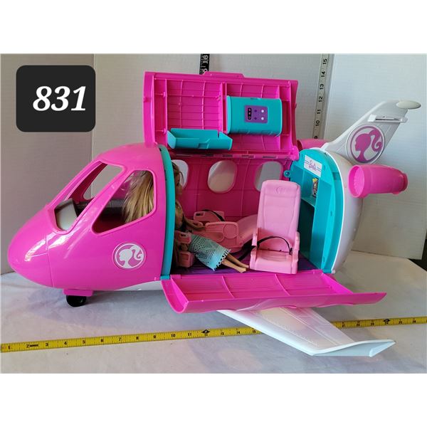 Barbie in the Barbie Dreamplane.