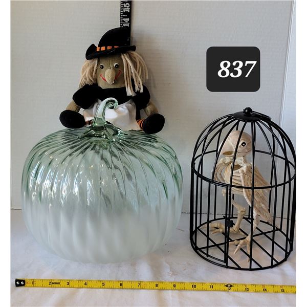 Glass pumpkin, witch & caged bird skeleton.