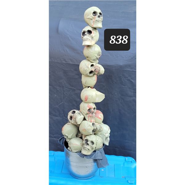 Outdoor Halloween tower of skulls. 51” H