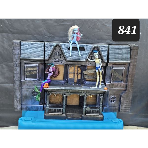 Monster house decoration & 3 Monster High dolls.