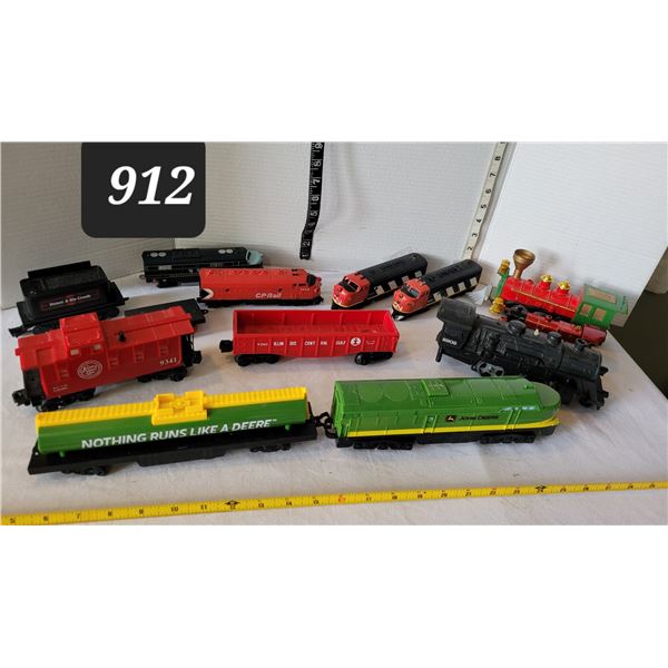 Group of trains. John Deere, Lionel engine, CN & CP. Some made in Hong Kong.