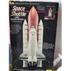 Image 2 : Space Shuttle model. Astronaut, book & other related models.